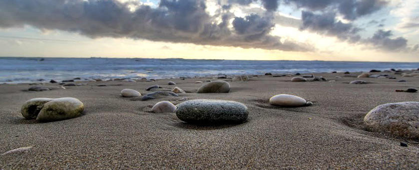 Rocks on the sand of Agios Gordios